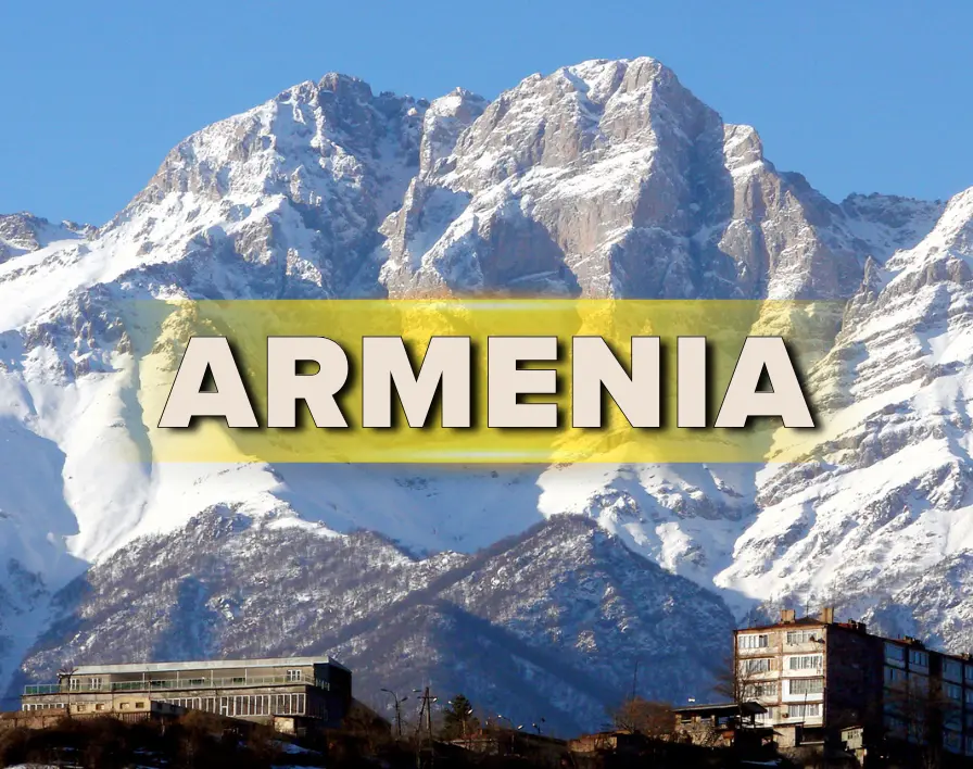 Snow-capped mountains and a scenic view of Armenia, showcasing an adventurous tour package.